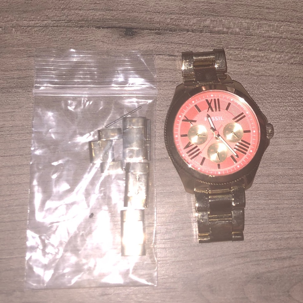 Orange face Fossil watch